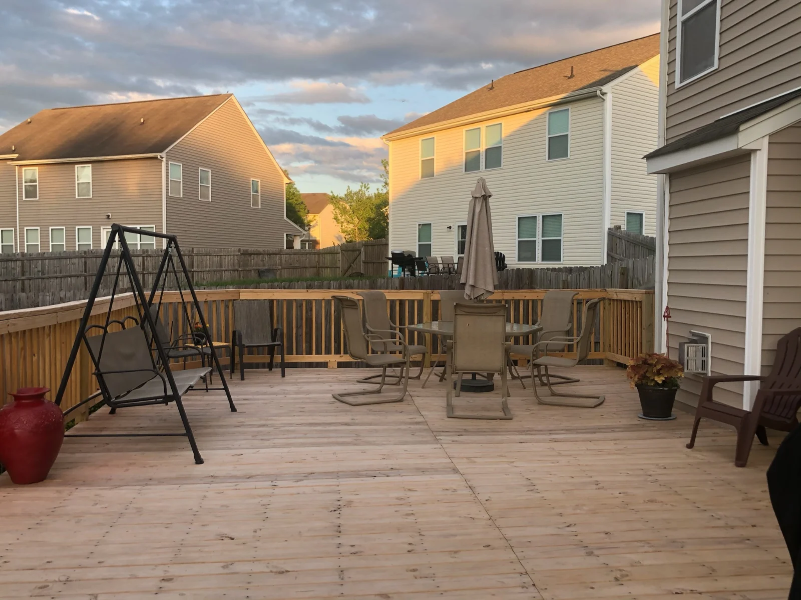 Wood deck swept and patio furniture wiped down by Spotless Cleaning Services in Monroe, NC