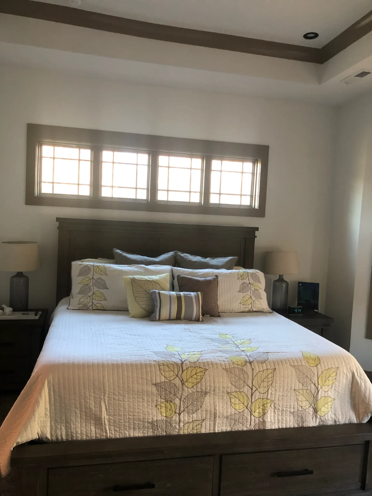 Primary bedroom with a freshly made bed and dusted nightstands by Spotless Cleaning Services in Monroe, NC